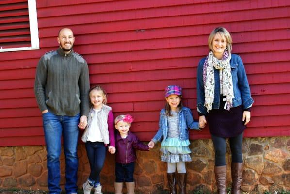 Dr. Chris with his wife and three daughters.