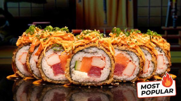 Sus Hi Roll! It's so good that we put our name on it, literally. Stuffed with tuna, salmon, crab, cream cheese, and cucumber. Tempura fried!