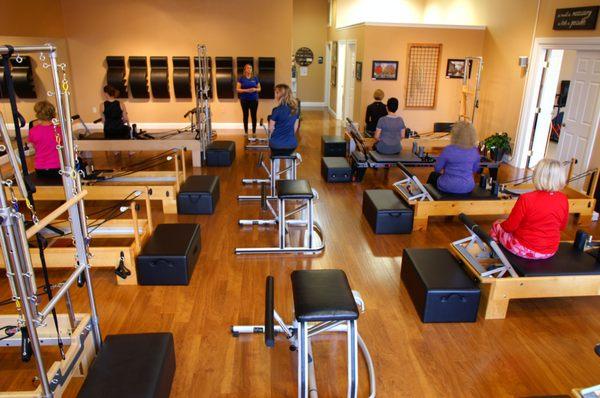 Full house in the Pilates studio! Reformers and Wunda Chair in use!