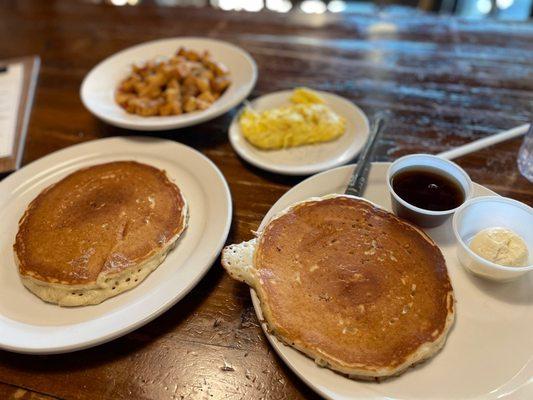 Pancakes, eggs, and breakfast potatoes