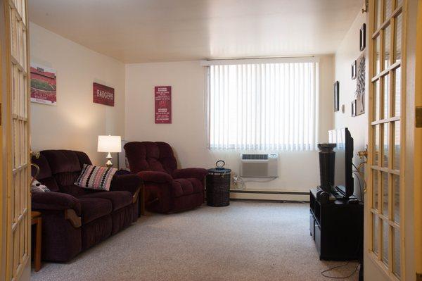 Living room inside a one bedroom deluxe apartment at Casa Blanca!