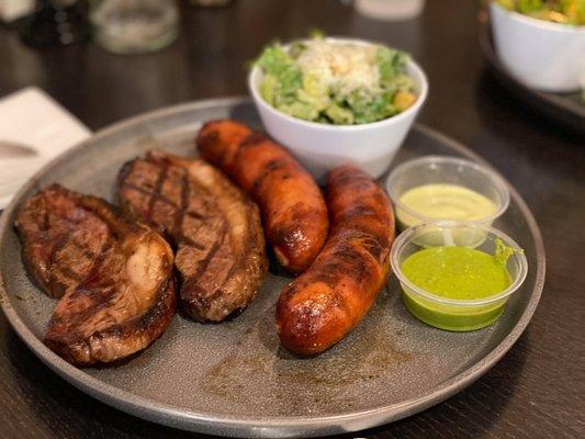 Picanha Steak Plate with extra sausage and Caesar salad.