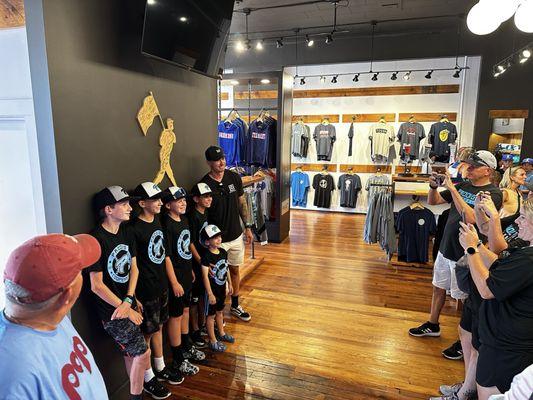 The 12U team hanging out and having fun together at the baseballism store in Cooperstown.