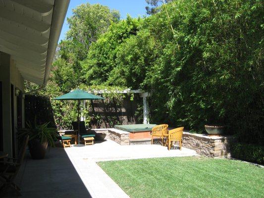 Sherman Oaks - The backyard was designed to provide room for a spa, seating walls and sunning area, patio dining, and a multifunctional lawn