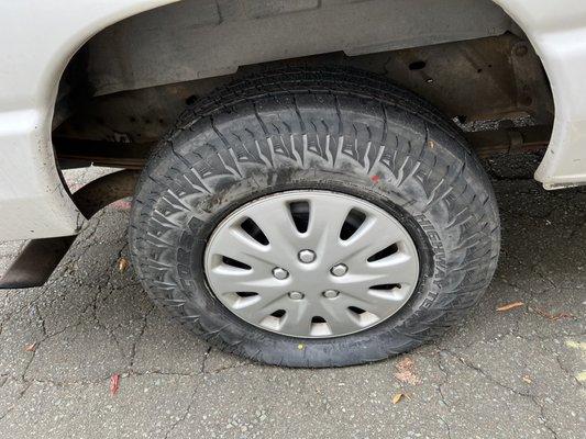 Flat tire with hubcap placed in wrong configuration so stem could not be accessed.