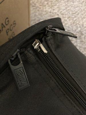 Light stand carrying bag zipper not lined up