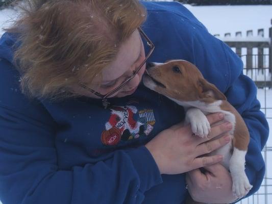 Dr. Tracy gets a kiss from her own dog "Bon Bon"