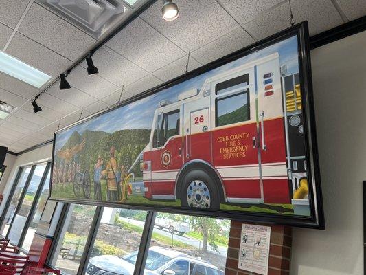 Cobb county fire truck art inside of restaurant