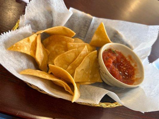 Complimentary appetizer the salsa has a nice kick and cute little bowl