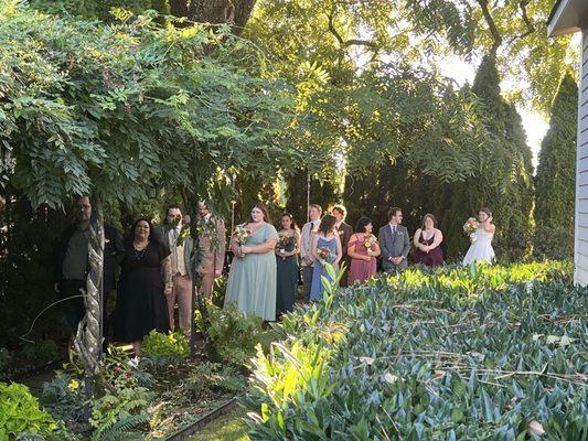 Stunning tunnel of love leading to ceremony sight. So many great outdoor photo spaces and places to wander