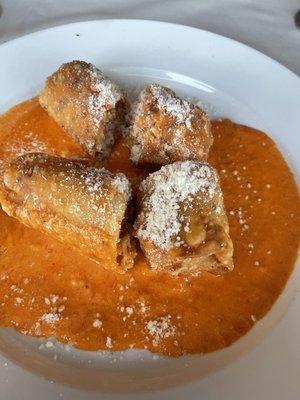 Chicken parm in egg roll with pink sauce