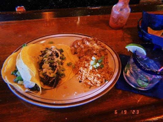 Spicy barbacoa taco plate with hand-pressed corn tortillas