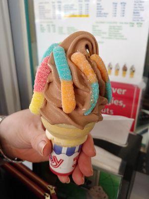 Chocolate cone with sour gummy worms.