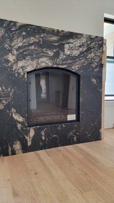 Fireplace with Titanium granite, not trimmed yet.