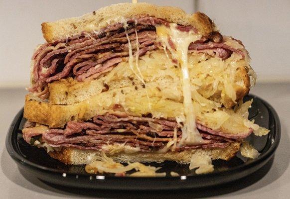 Half pound of pastrami / corned beef sandwich. OK. Does this look like it is worth $22? Normal size bread...