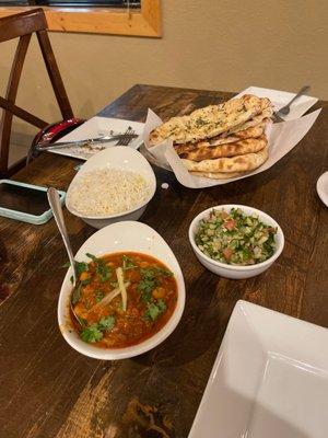 Chaana Masala, naan basket, and salad