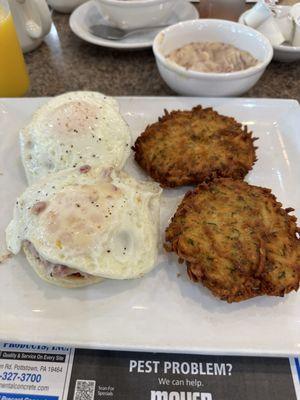 2 eggs over easy w/ chip beef over an open faced biscuit & side of potato cakes!