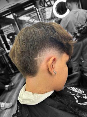 Burst fade faux hawk