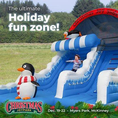 Huge inflatable slide, a big bounce pad, and more fun activities await - at Christmas JoyPark!