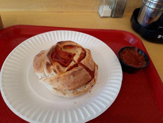 Lunch today is pepperoni pinwheel with marinara sauce