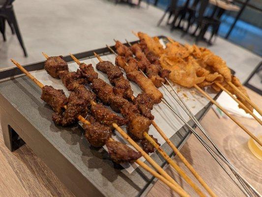 Beef skewers, charcoal grilled pork skewers, chicken skin