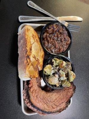 Brisket plate with Brussel sprouts and pit beans.