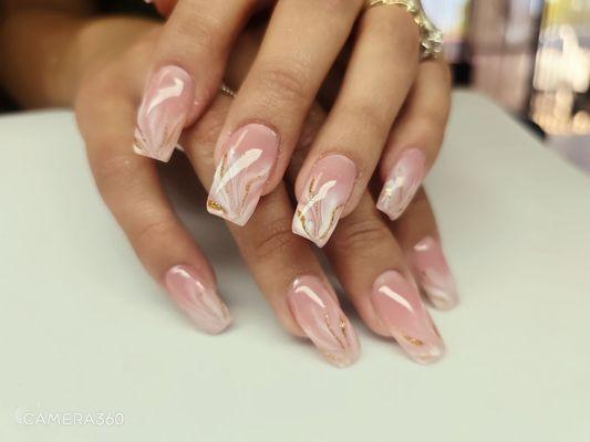 Elegant, sexy, and Sassy. These marble nails go with any out fit for any event.  One of my favorite.