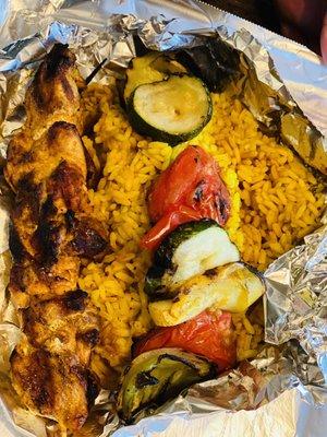 Chicken kabob with yellow rice grilled vegetables and salad (not in pic, obs)