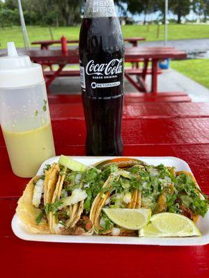 Tacos Al Pastor and Tacos Asada with their awesome salsa verde and of course Mexican coke