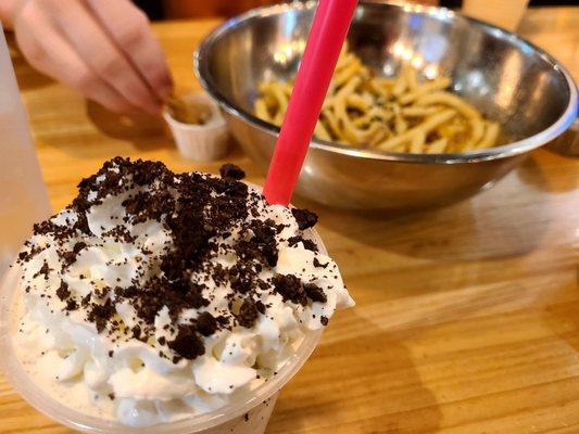 Small oreo shake, very good. Shareable truffle fries in the background