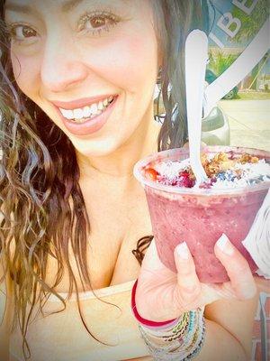 Açaí bowl with added coconut flakes. They make their own granola!