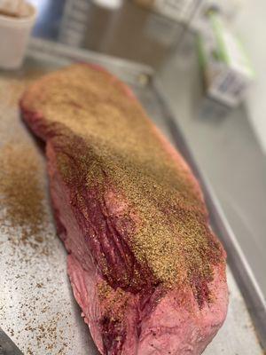 Delicious brisket being expertly prepared in our Texas Star BBQ kitchen. Mouthwatering perfection in the making! #texasbbq #brisket #foodpre