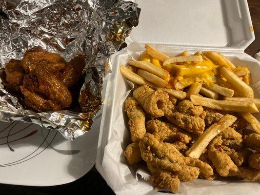 Honey glazed wings, cheese fries, and catfish nuggets