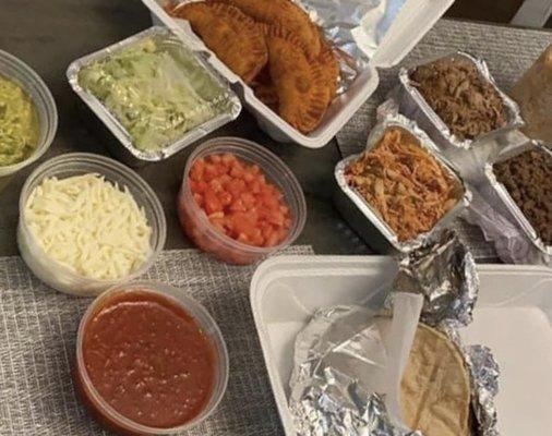 Family Taco Bar with Empanadas and Guacamole 
**Disclaimer: Empanadas and Guacamole Sold Separately**