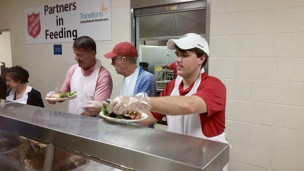 Michael serving lunch at Transitions Homeless Shelter in Columbia.