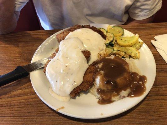 Chicken fried chicken with mashed potatoes and squash