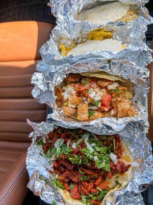 From front: Al pastor, Chicharon a la Mexicana, breakfast tacos - all were delicious