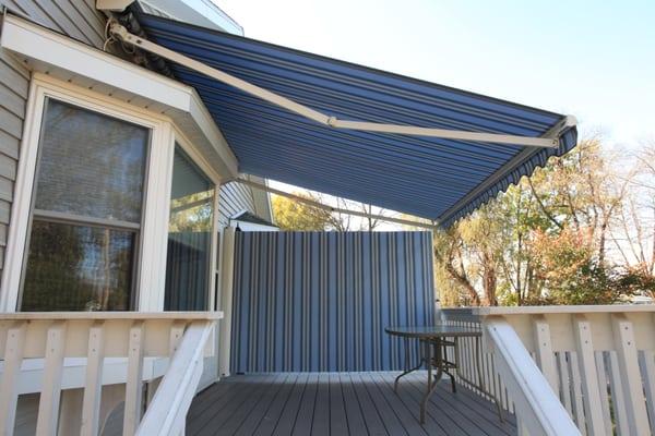 Retractable Awnings AND Shades to defeat that nasty Southern & Western sun.