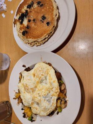 BYO skillet (turkey sausage, onion, green pepper, mushroom, cheddar cheese, roasted potatoes, over easy eggs) either blueberry pancakes