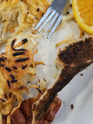 Burnt toast and hash browns.