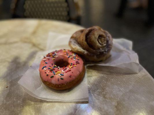 Pink Sprinkled donut and Cinnamon Roll