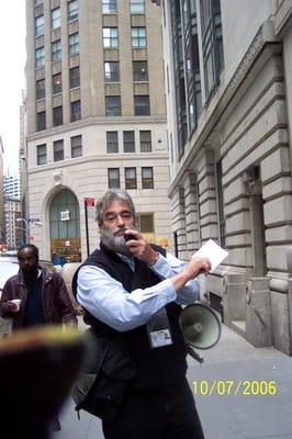 Marty leading tour near Wall Street.