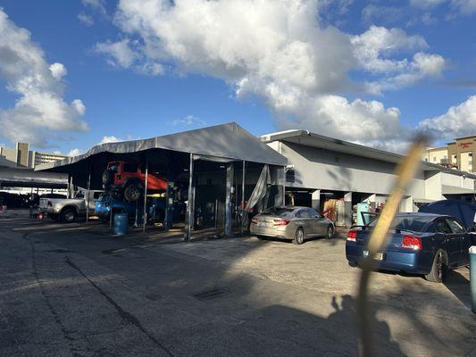 Service area that's looks more like a derelict junkyard.