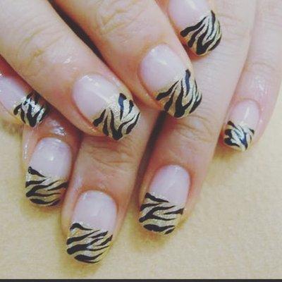 Zebra strips nail art.