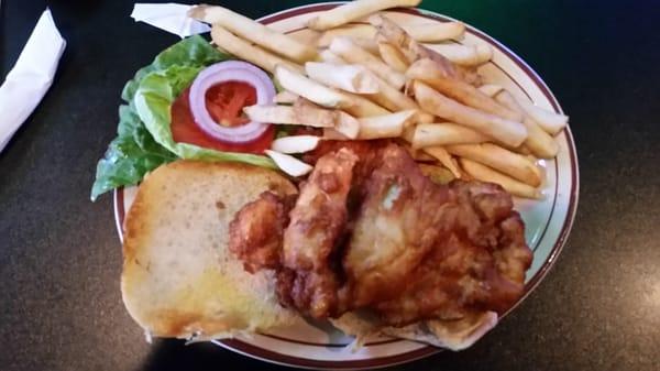 Batter fried chicken breast sandwich and fries