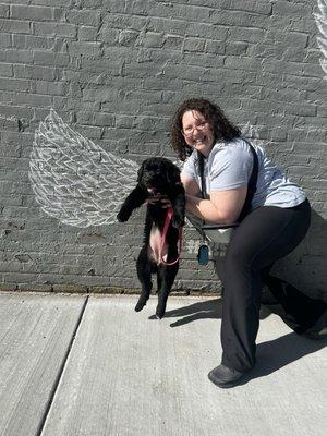 You Can Fly mural outside the shop.