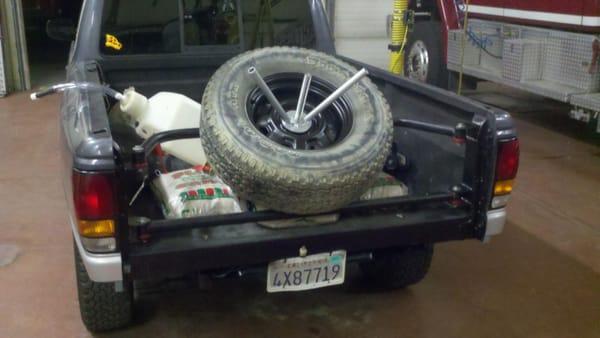 BRAD'S SPARE TIRE HOLDER,