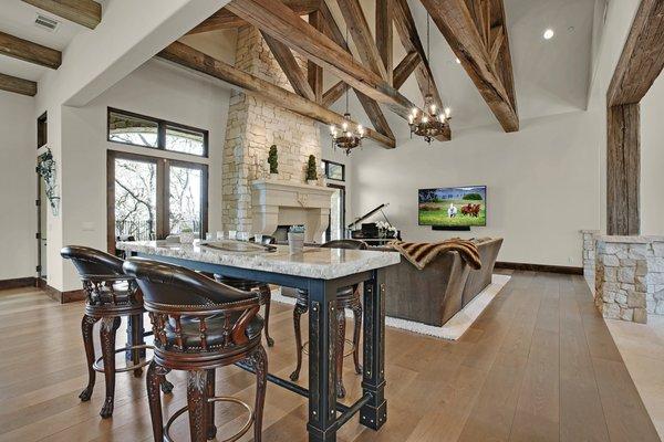 Hand crafted custom Tresselwood beams and framing both inside and outside the home