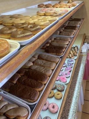 Display of fresh made donuts.