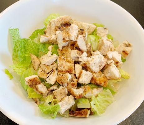 Build your own bowl: plain romaine lettuce with grilled chicken on top. They definitely didn't skimp on the chicken! Seasoned perfectly.